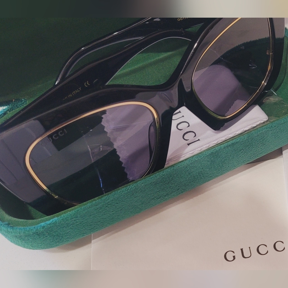 Gucci Black Eyewear with Gold Detailing
